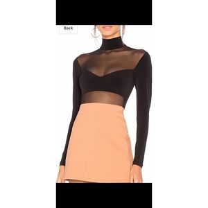 Black and sheer body suit. Long sleeve. New